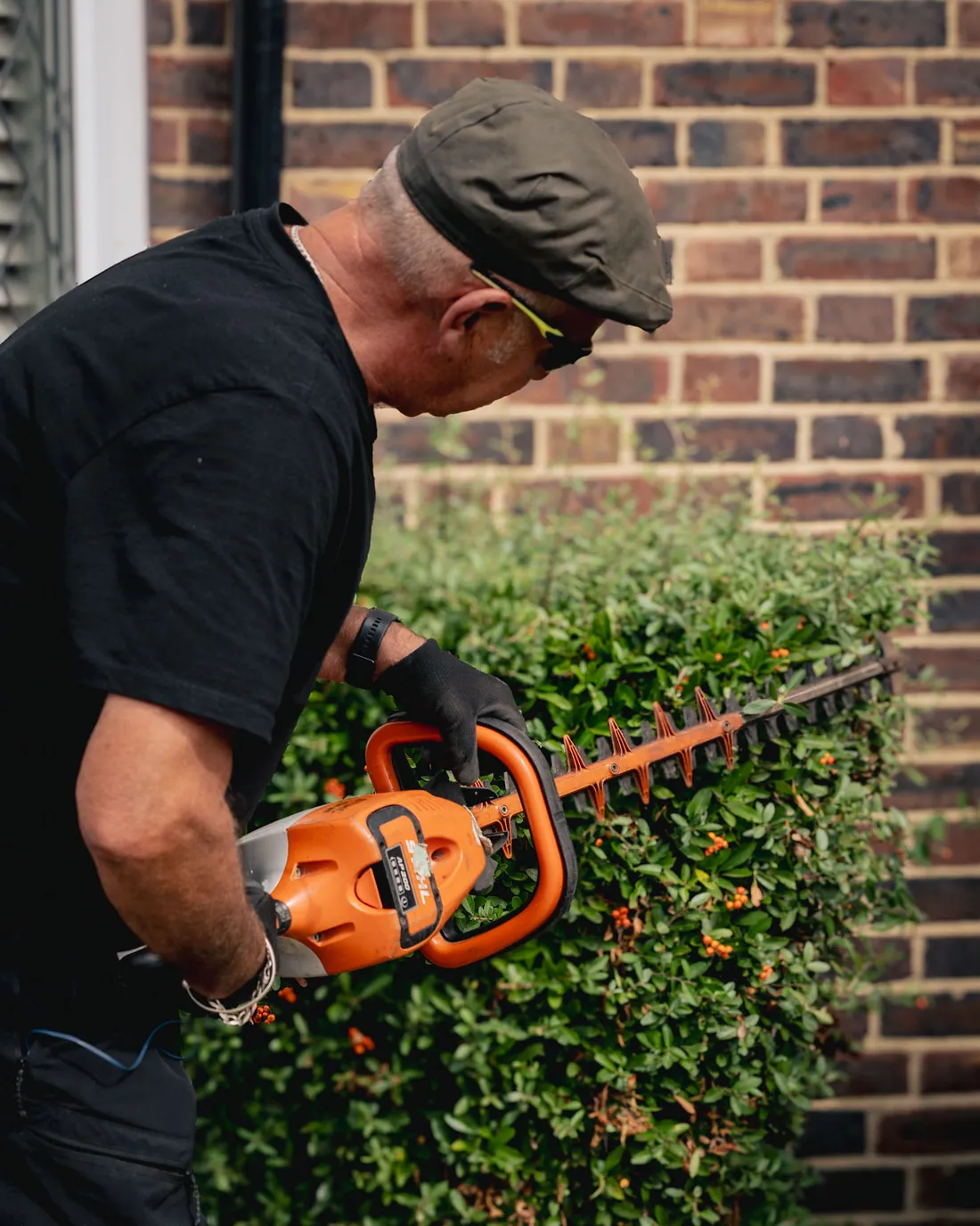 A Willow Alexander gardener at work in an established South London garden